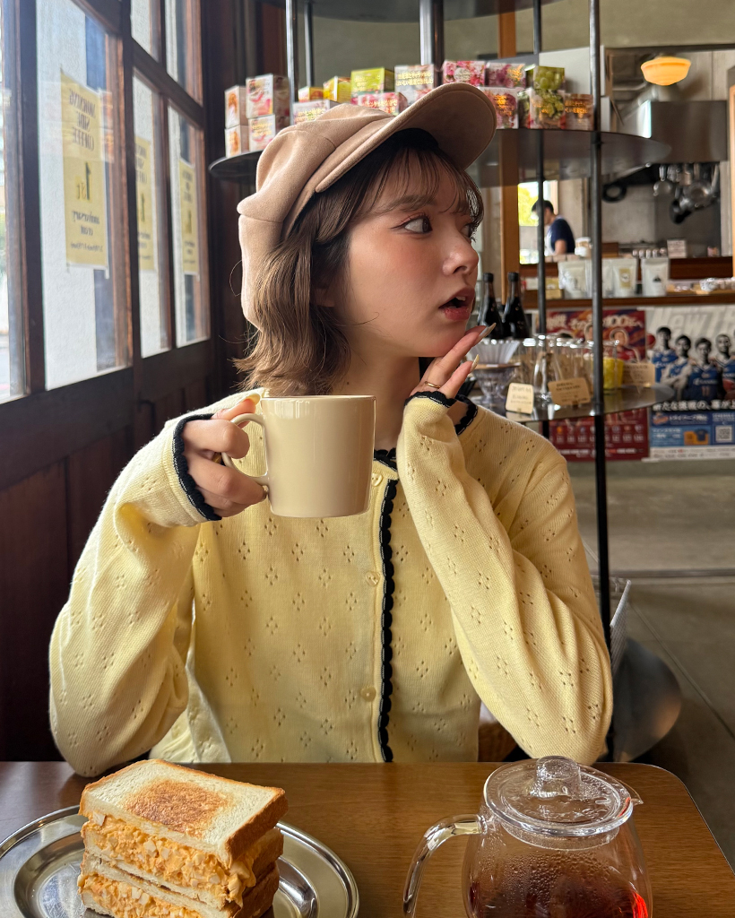 ハートボタンスカラップポワンテルカーディガン