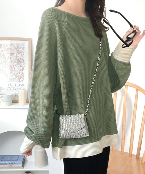 遊び心のある程よい透け感。オーバーサイズワッフル編みドルマン