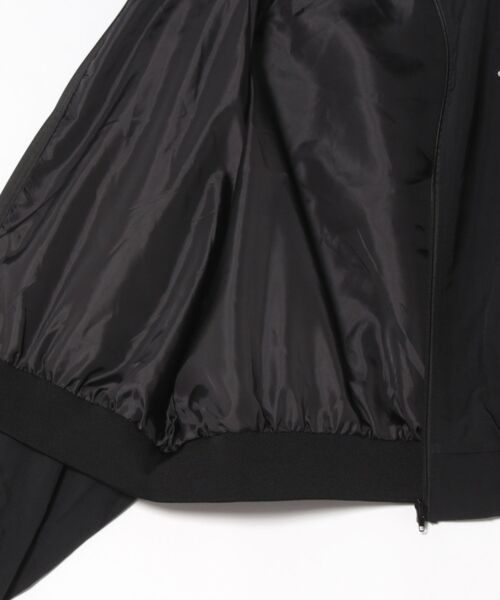 大人スポーティMIX。胸刺繍入り袖ファスナー配色ナイロンジャケット