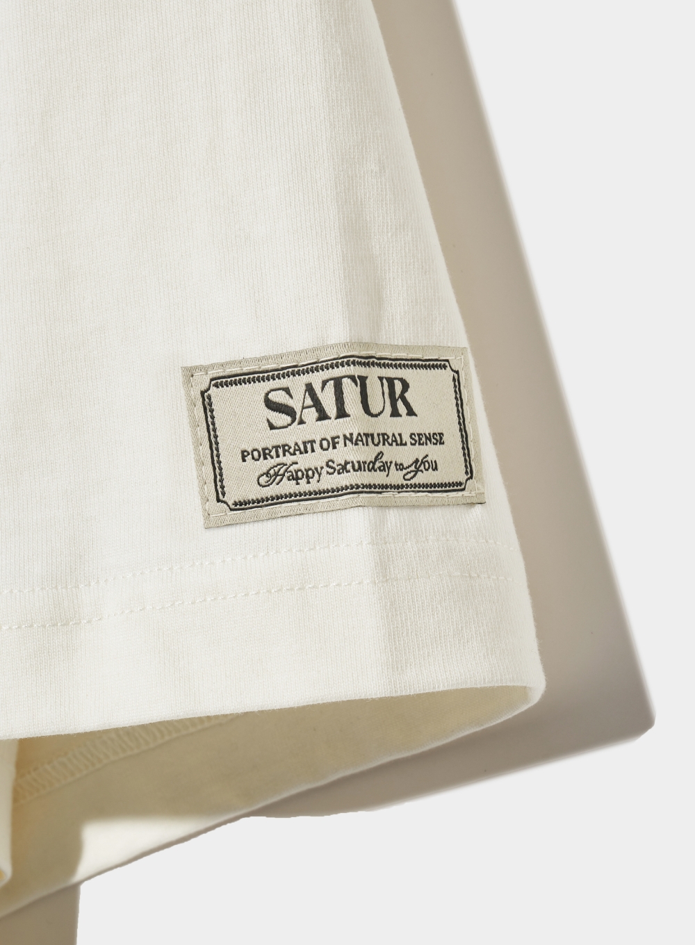 【SATUR】Satur Logo Voyage T-Shirts - Resort Ivory MUSINSA | SATUR Satur Logo Embroidered Voyage Short Sleeve T