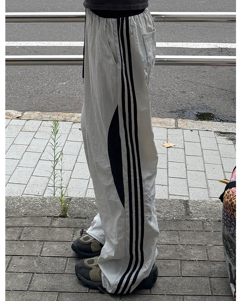 サイドラウンドポイントウィンドブレーカーパンツ