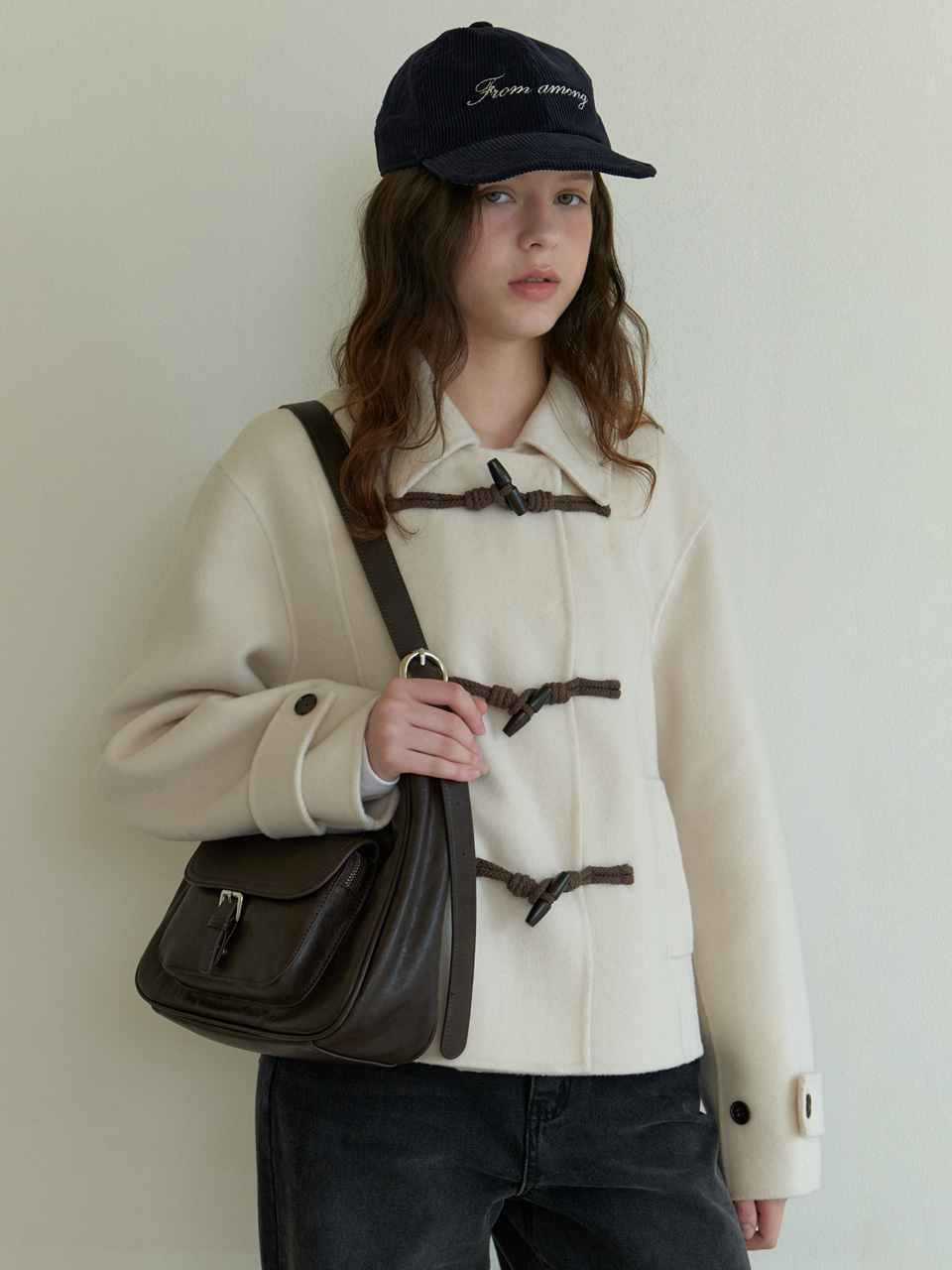 A BUCKLED POCKET SHOULDER BAG_BROWN