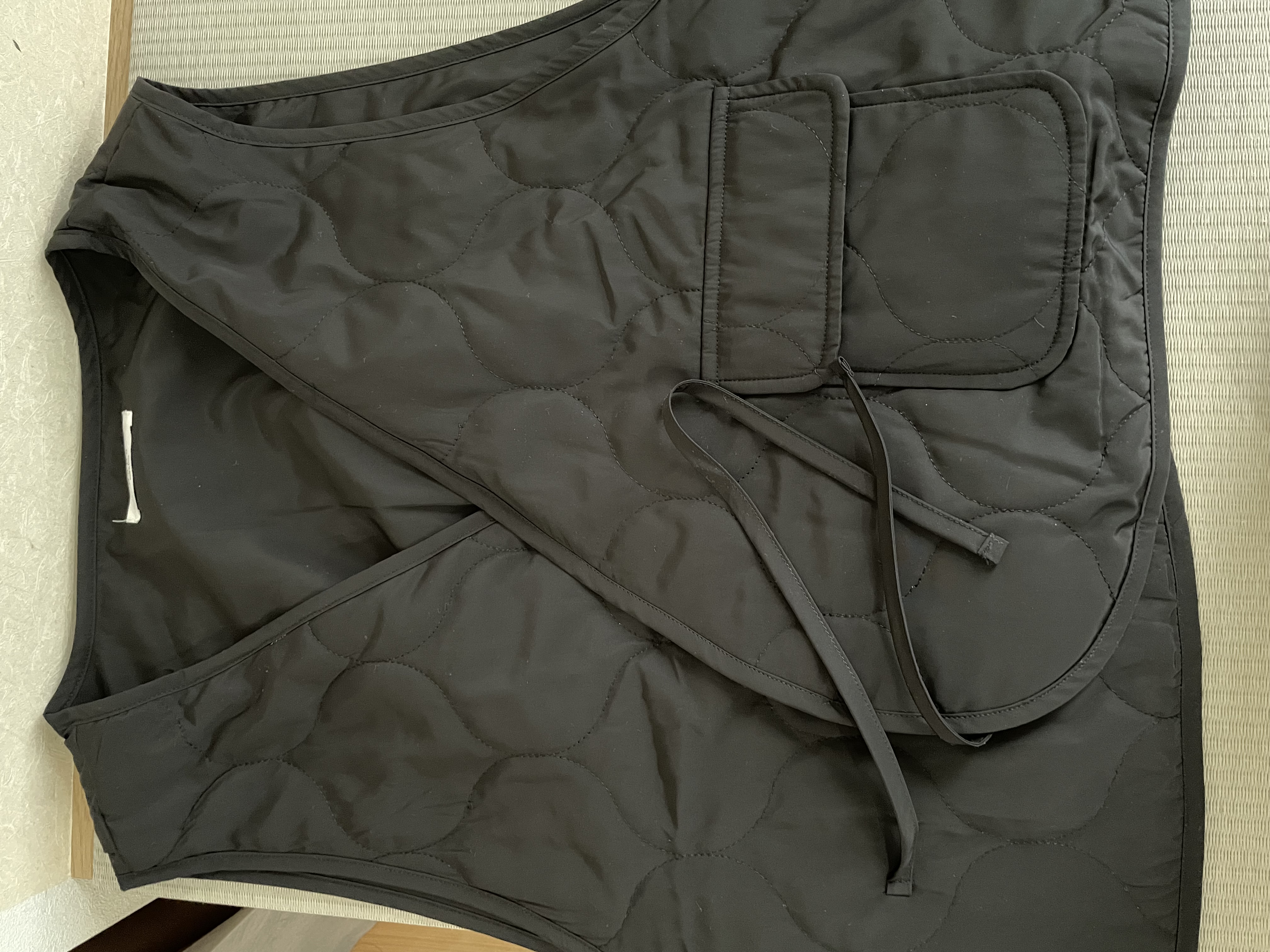 Wrap ribbon quilted vest ／nugu klee Ribbon Quilted Vest / Nugu Klee