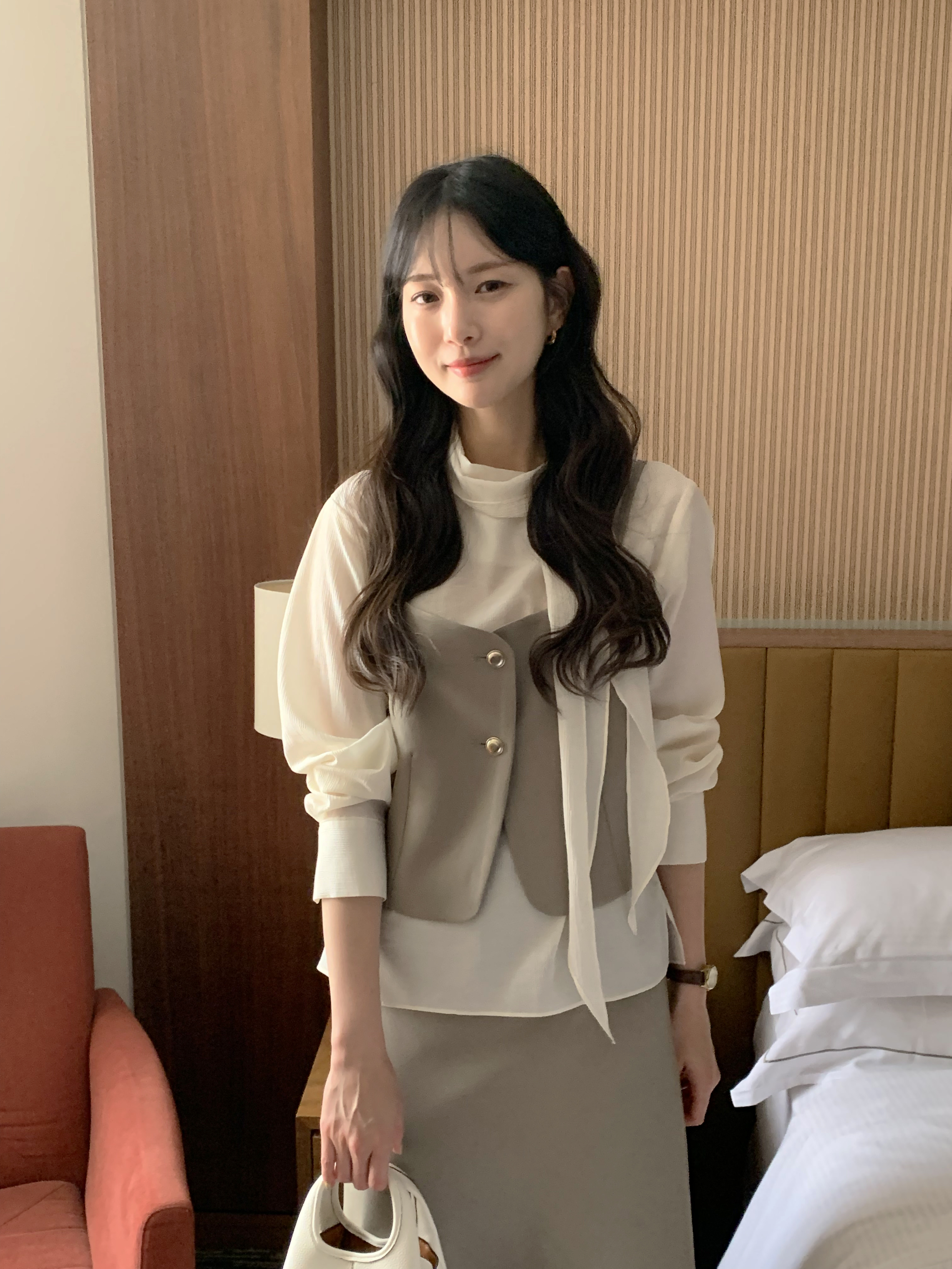 ボタンビスチェ