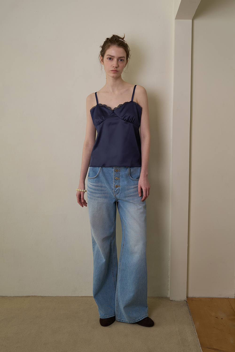 Button washing denim