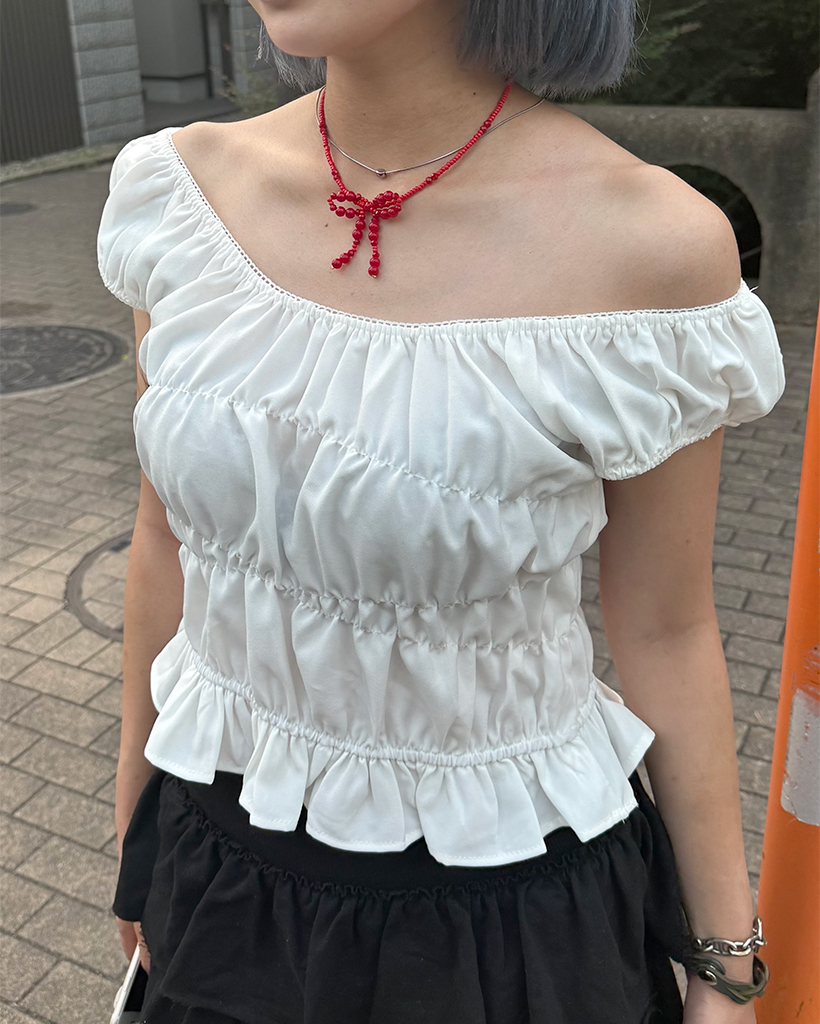 フリルバンディングシャーリングスリーブレスブラウス