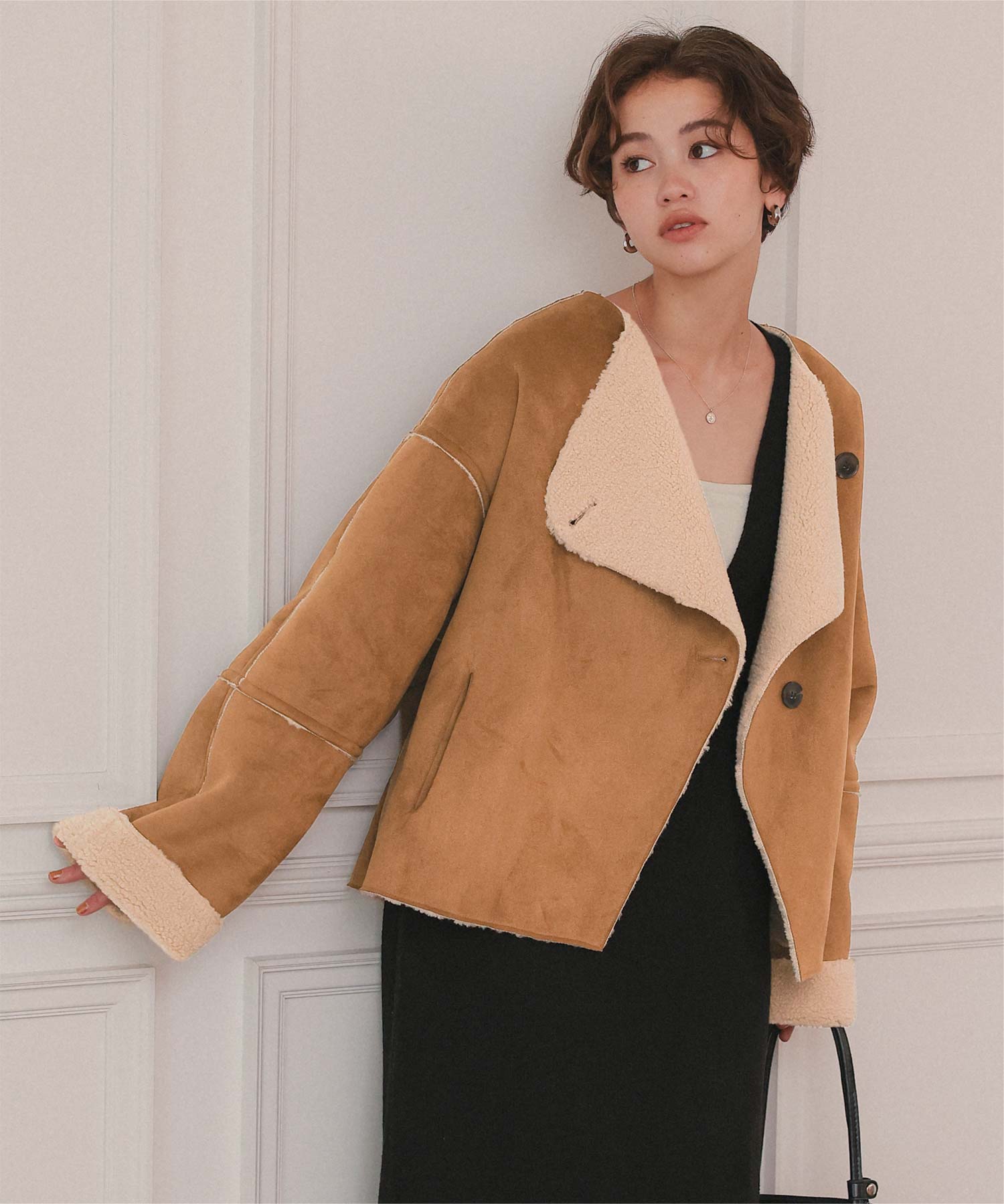 フェイクムートンノーカラージャケット