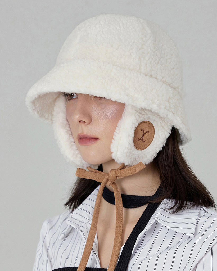 VA Curved Logo Sherpa Fur Flap Bucket Hat Cream