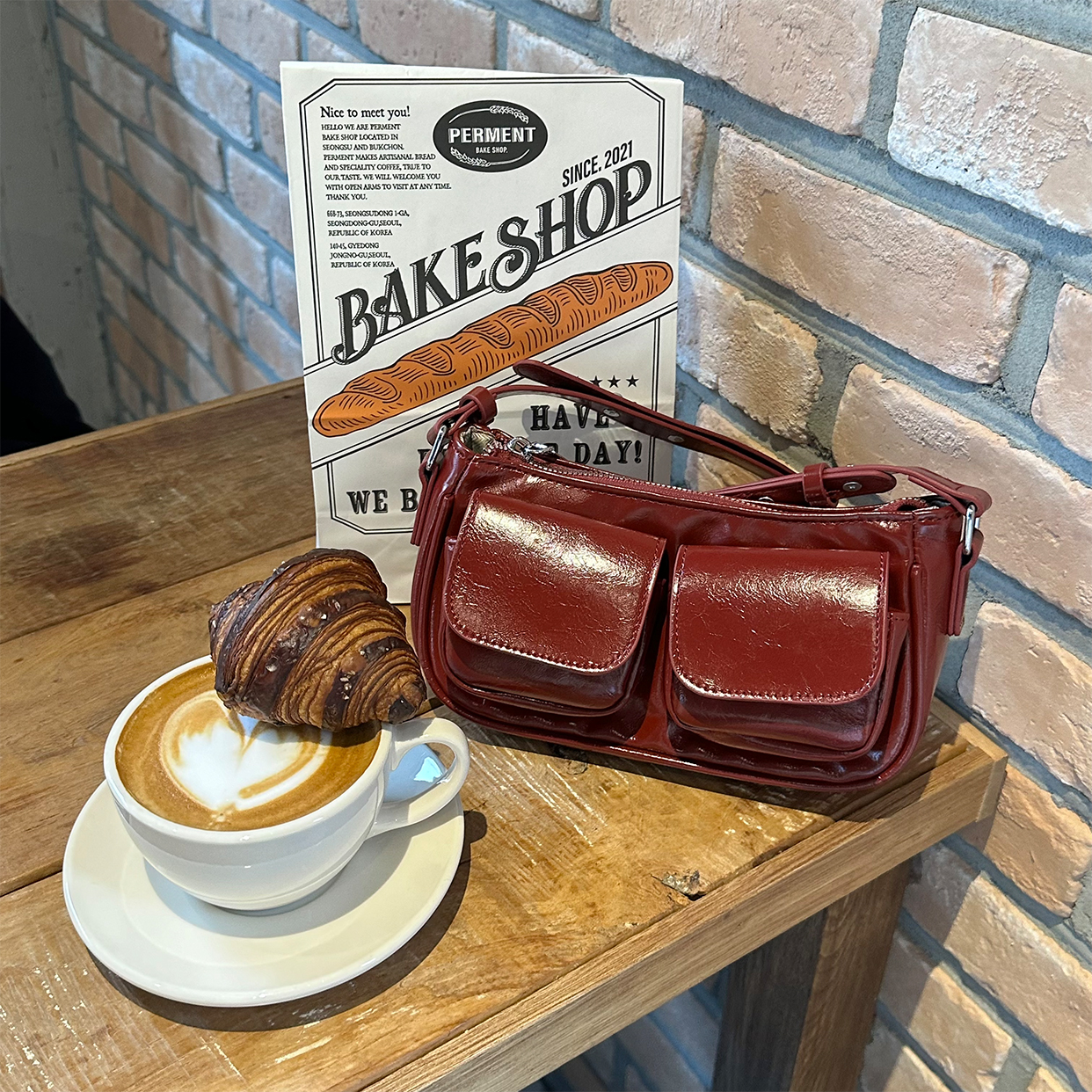 【関税・送料無料】JW ANDERSON バケットバッグ JW Anderson Corner レザーバケットバッグ | ブラウン | FARFETCH JP