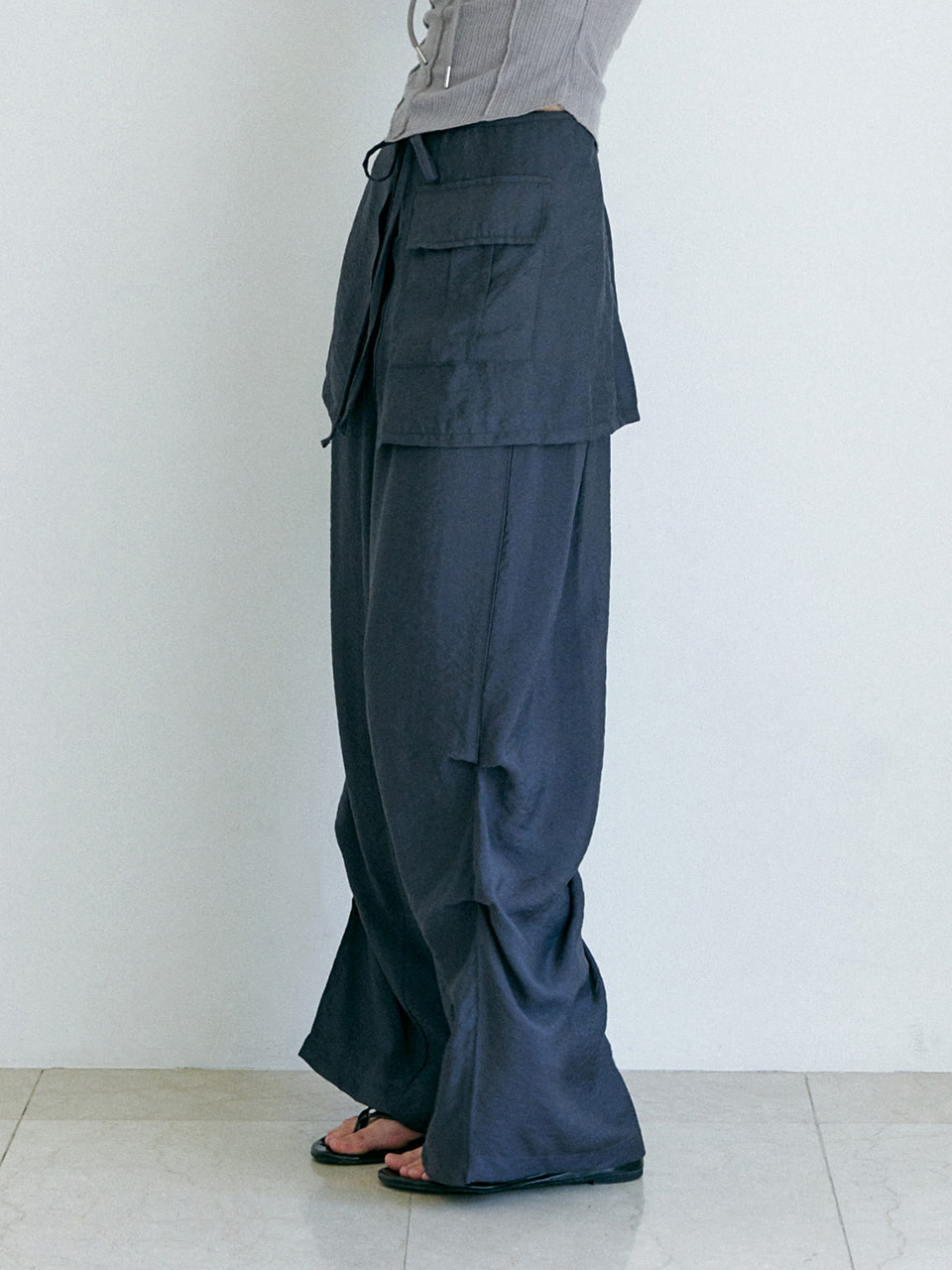[FANCY CLUB] UNBALANCE SKIRT LAYERED PINTUCK PANTS /追跡付 A'GEM/9 × .kom 『 FANCY CLUB/ファンシークラブ』 UNBALANCE